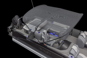 The Catalina Versatile Rear Bench is a pontoon boat featuring a black canopy cover, multiple gray seats, a steering console, and blue LED cup holders. It boasts a modern design with an outboard motor visible at the rear.