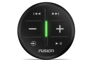 A round black media control device with a minimalist design. It features volume control symbols (- and +), play/pause, power, and forward/backward navigation icons. A vertical green LED light strip is in the center, and "Fusion" is written at the bottom.