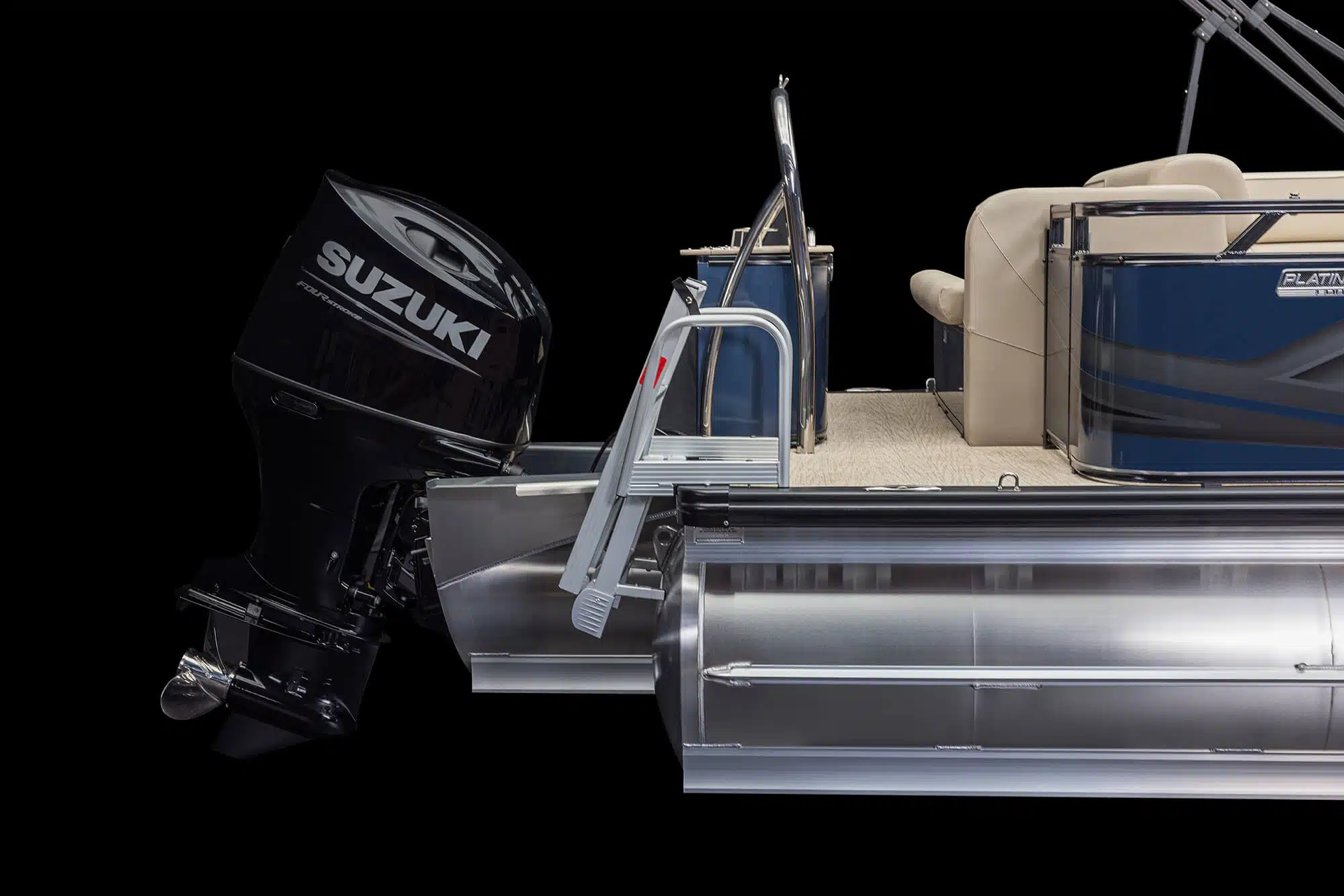 Close-up side view of a Venture Cruise Rear Bench with a Suzuki outboard motor attached at the rear. The boat features metal pontoons, a blue exterior, and an interior with beige seating. A small section of the boat's deck and stairs is also visible. The background is black.