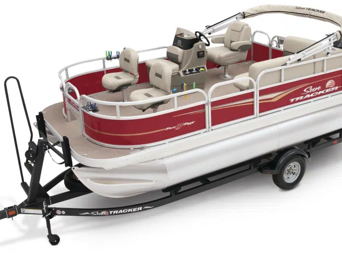 An Avalon Pontoons boat design with the shades of white, brown, red, and black