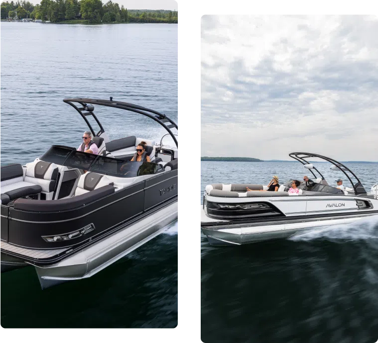 Two sleek pontoon boats cruise across the lake under a partly cloudy sky. The black one, with a sturdy weight, has people relaxing onboard, while the white one carries passengers enjoying the ride. A lush green shoreline is visible in the background, enhancing the serene atmosphere.