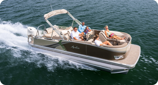 A pontoon boat from top brands with six people glides across the tranquil water. Under the protective canopy, passengers unwind and revel in the serene ride, their laughter mingling with the gentle wake that trails peacefully behind them.