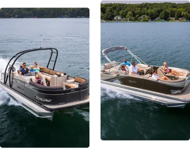 Two pontoons, expertly crafted with modern boat terminology, float on a sunlit lake as groups of people enjoy the day. The first pontoon boasts a dark and tan design, while the second displays a sleek, light-colored finish. In the background, a forested shoreline frames cozy houses.